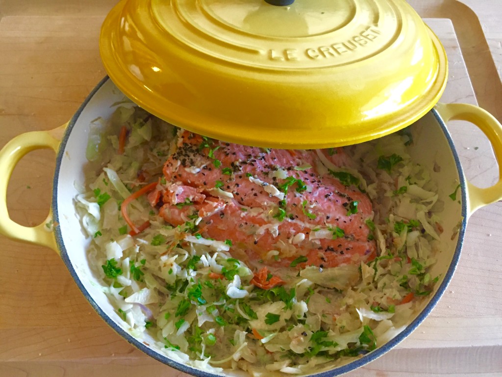 Salmon on a bed of creamy cabbage. Prime example of a recipe for two in this cute little braiser.